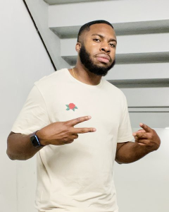Don, co-host of Two Texas Teas, throwing peace signs